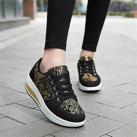 stylish black sneakers women's.